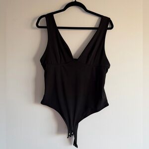 Dynamite Black Deep V-Neck Bodysuit Sleeveless Snap Closure Size L NWT